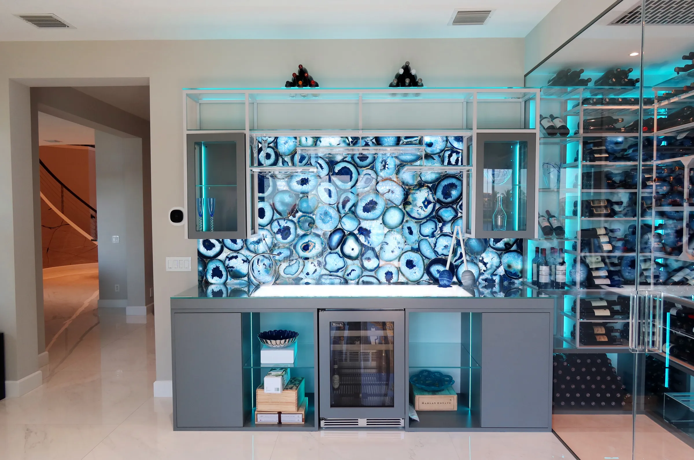 Modern wine room bar Parkland FL - wide view wine racks and bar, lacquered steel, Barnsley