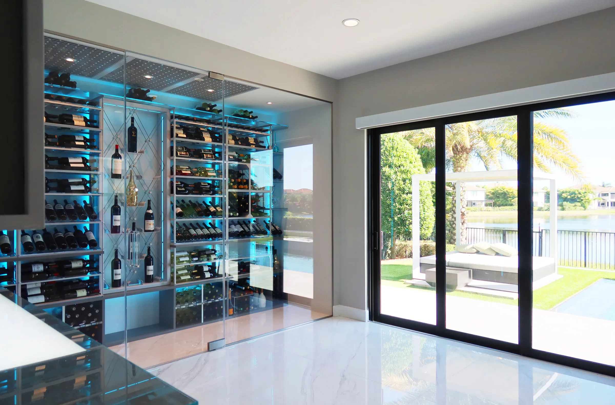 Modern wine room bar Parkland FL - bar detail, wine service area, custom steel racks, Barnsley