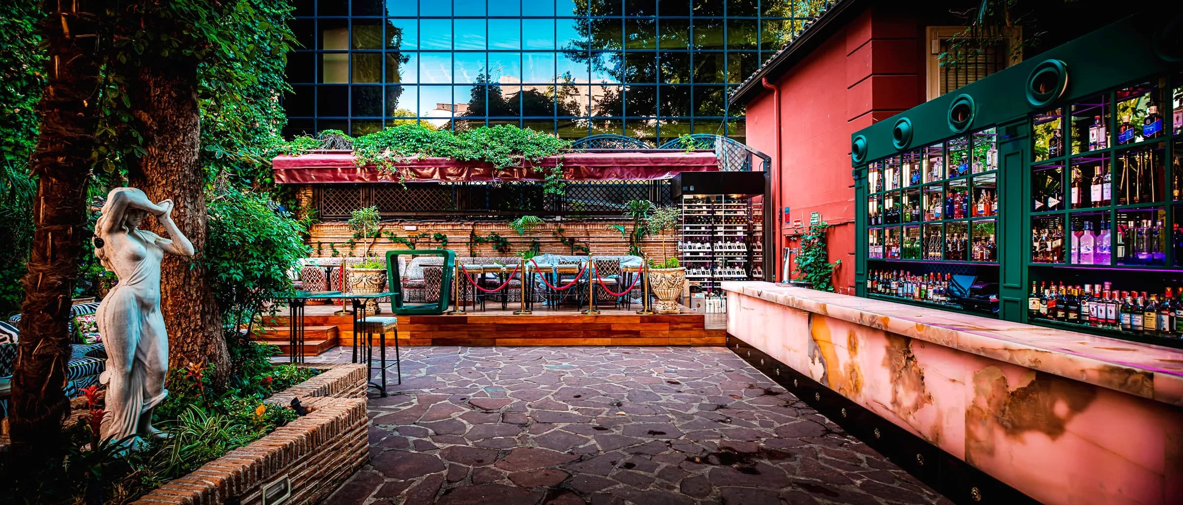 Bespoke wine cellar Spain at Rest Fortuni with floor-to-ceiling glass enclosures and custom wine racks