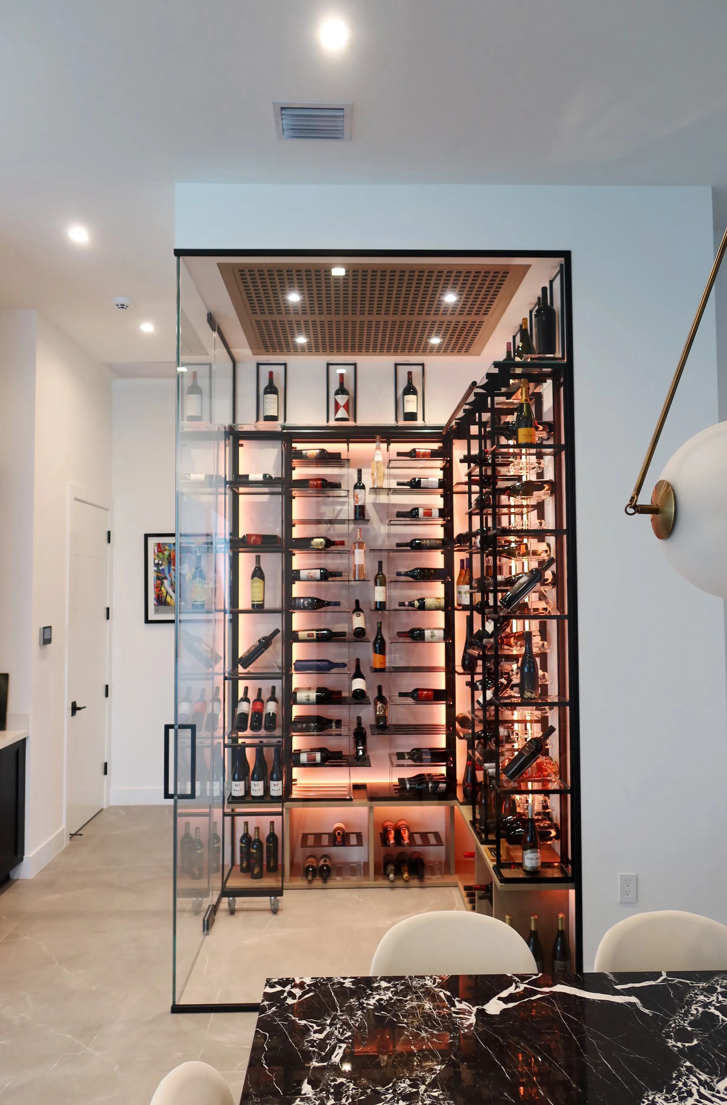 modern wine room Boca Raton Florida, sleek contemporary wine storage, premium materials, elegant wine display, luxury residential wine room — photograph 1 of 2