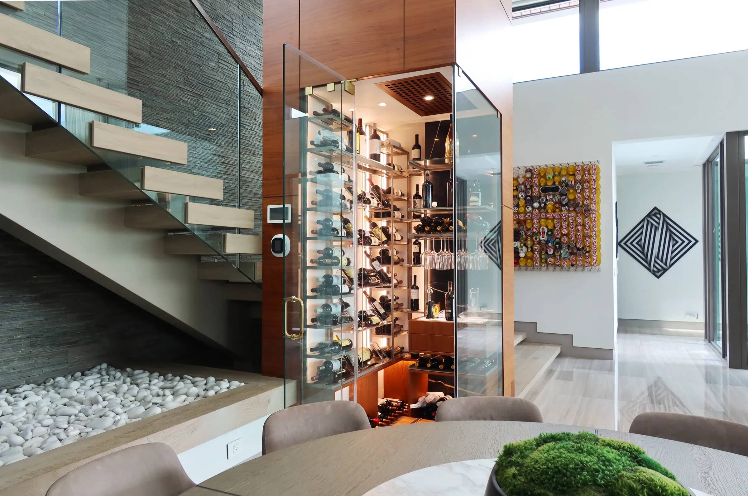 Luxury wine room Miami featuring custom floor-to-ceiling metal and wooden wine racks, and LED lighting, modern style — photograph 2 of 5