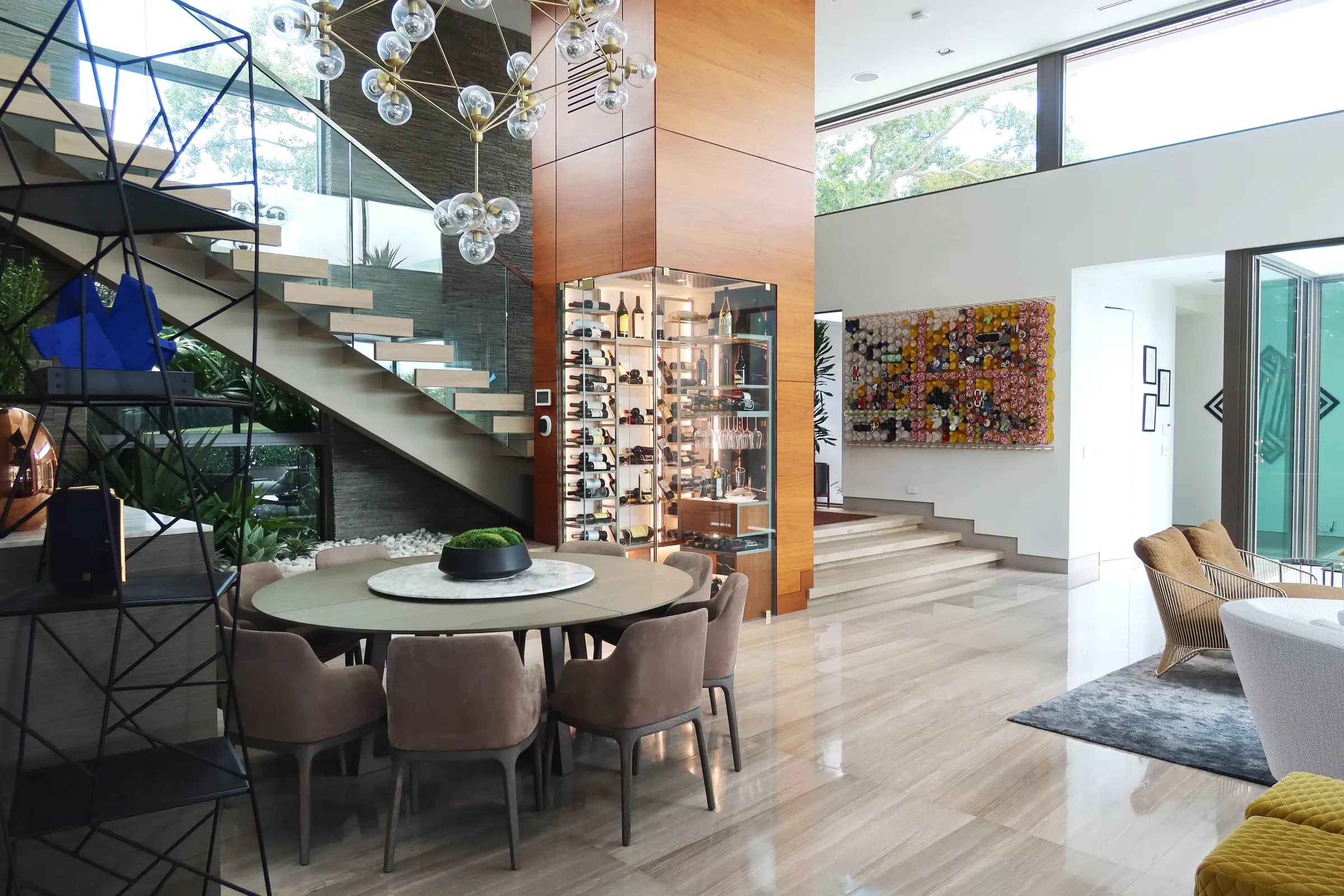Luxury wine room Miami featuring custom floor-to-ceiling metal and wooden wine racks, and LED lighting, modern style — photograph 5 of 5