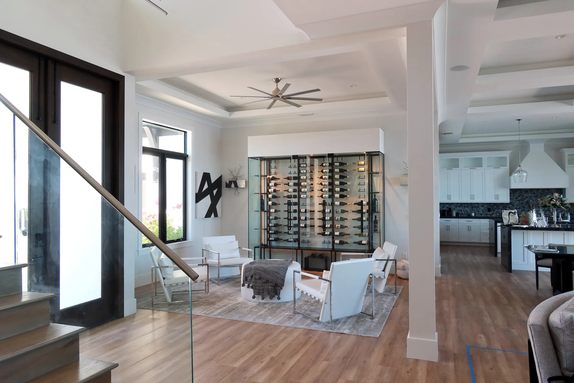custom wine wall North Palm Beach Florida, black lacquered hooks, metal racks, warm white LED lighting, glass shelving, wine crates storage — photograph 2 of 3
