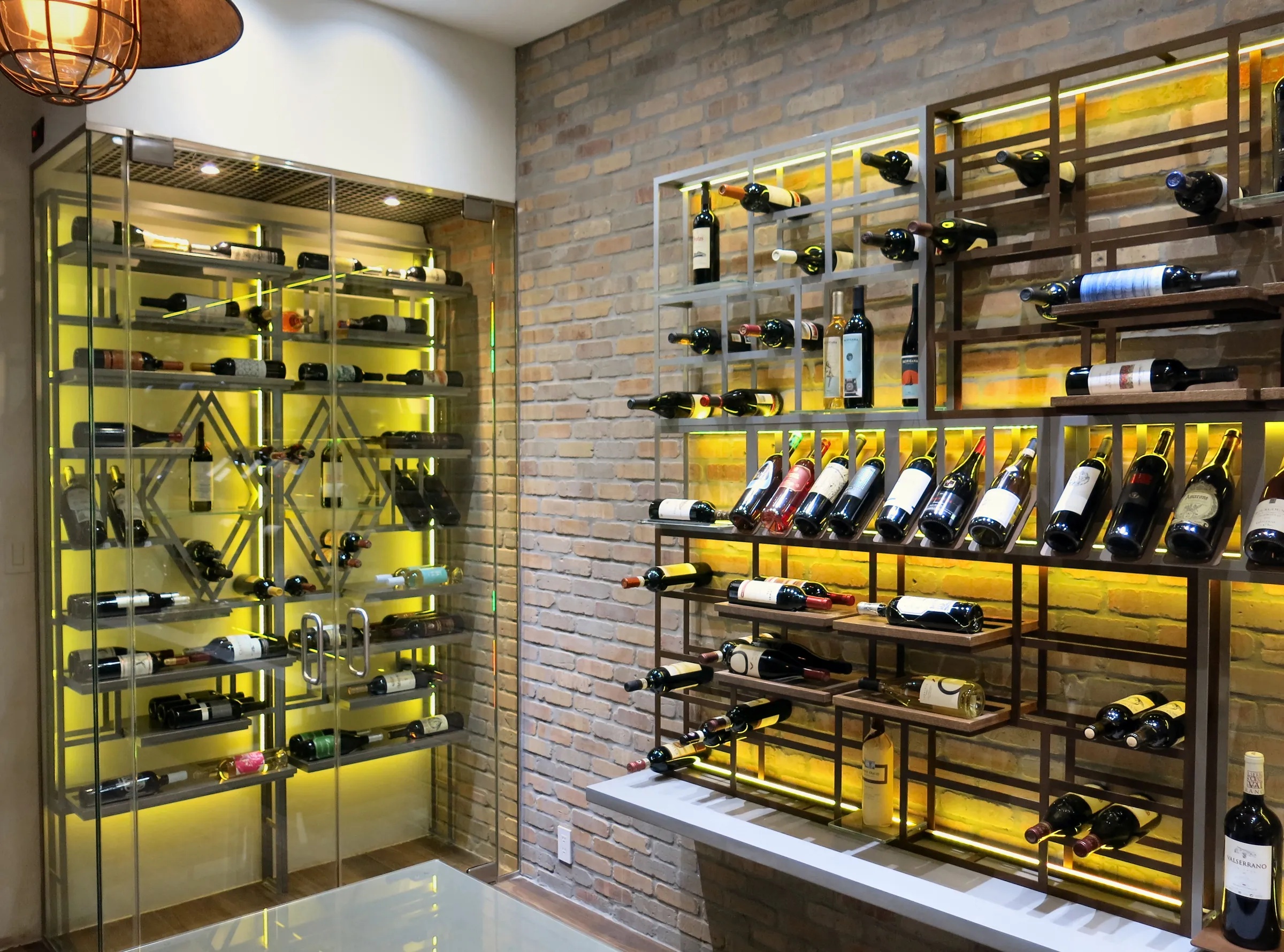 Luxury wine room Miami featuring custom floor-to-ceiling metal wine racks, and LED lighting, modern style — photograph 4 of 5