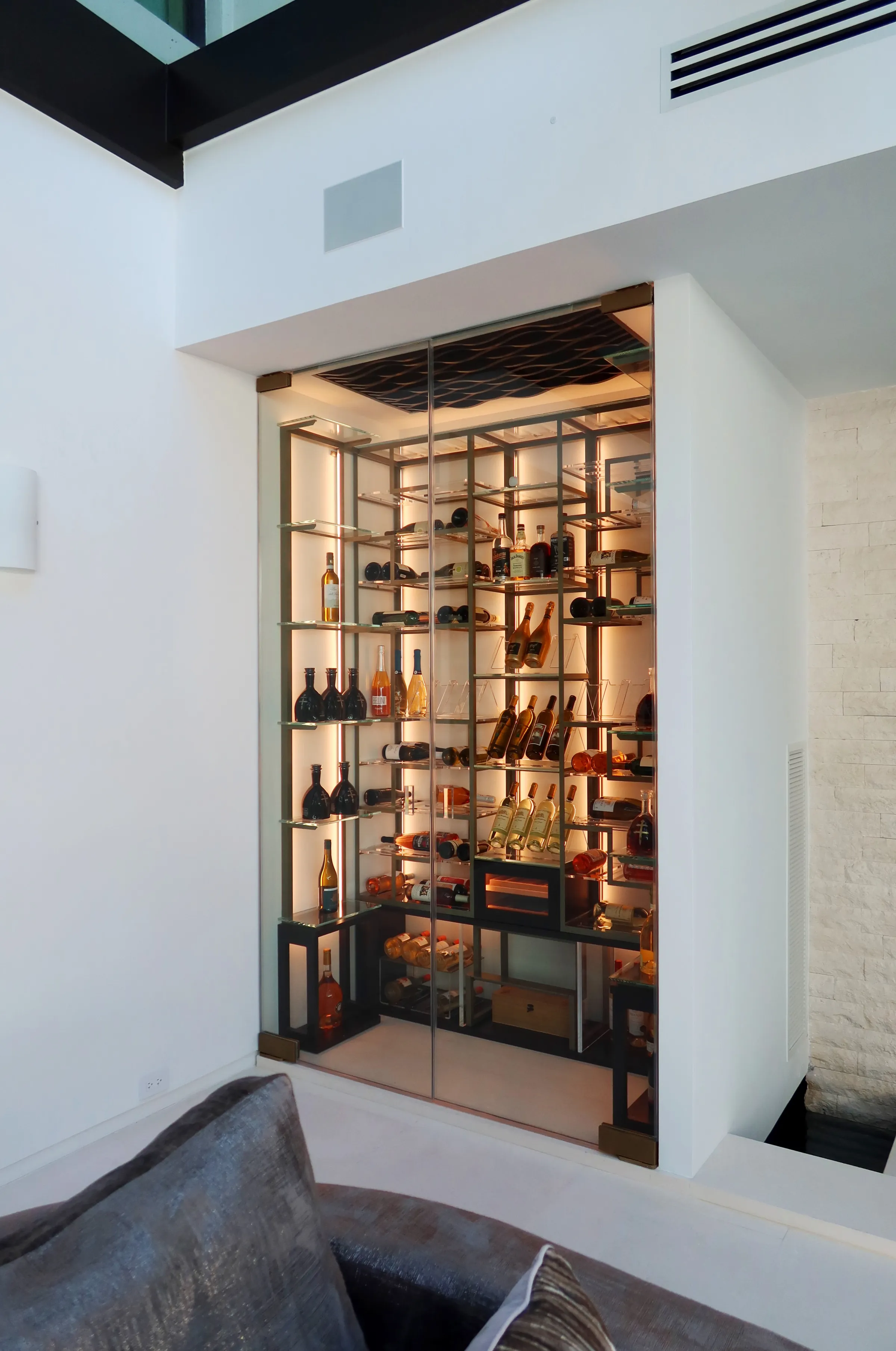 Celebrity wine cellar DJ Khaled Miami - floor-to-ceiling wine racks, custom storage, luxury home