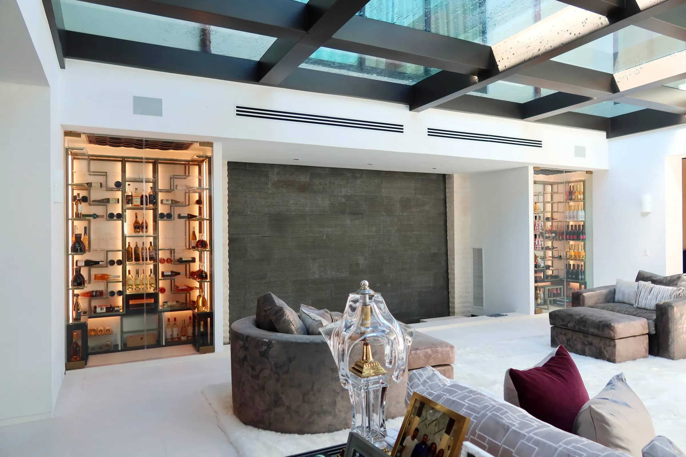 Celebrity wine cellar DJ Khaled Miami - wide angle wine room view, custom racks, ambient lighting