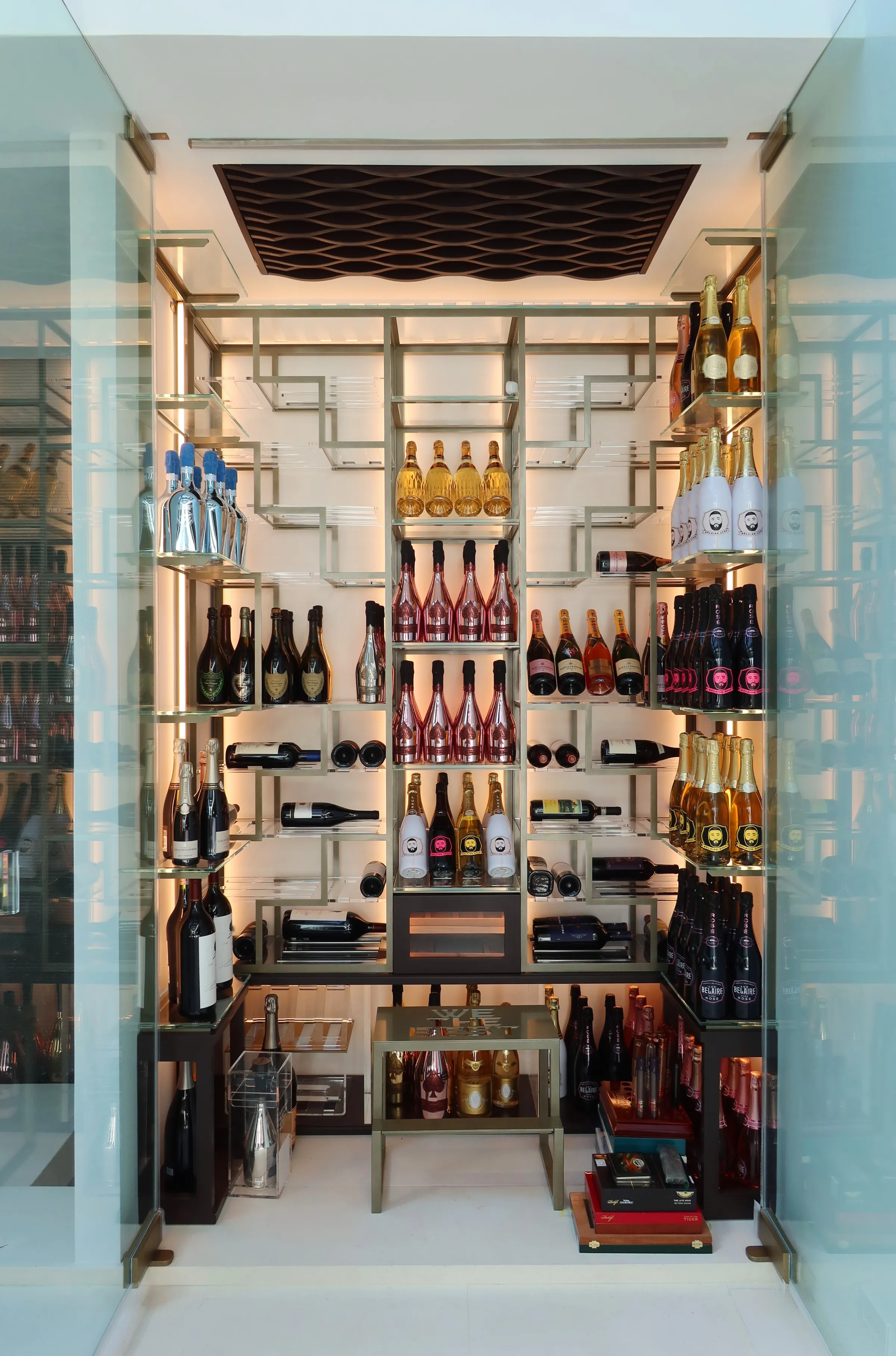 Celebrity wine cellar DJ Khaled Miami - right wing wine racks, full bottle display, luxury design