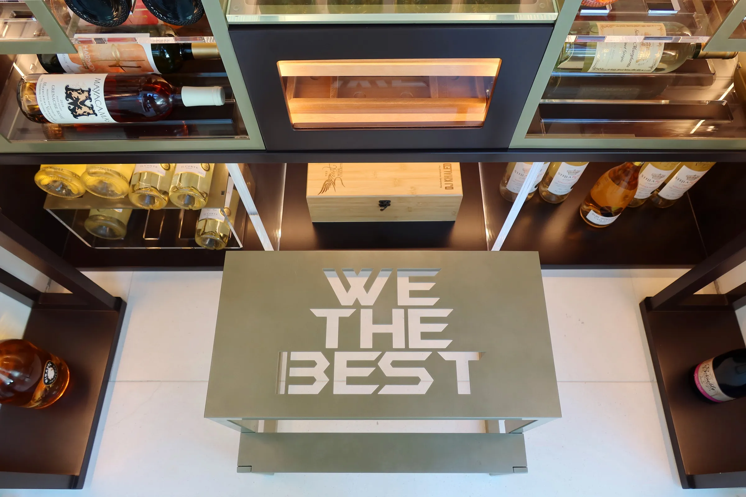 Celebrity wine cellar DJ Khaled Miami - tasting stool, wine service area, custom luxury cellar