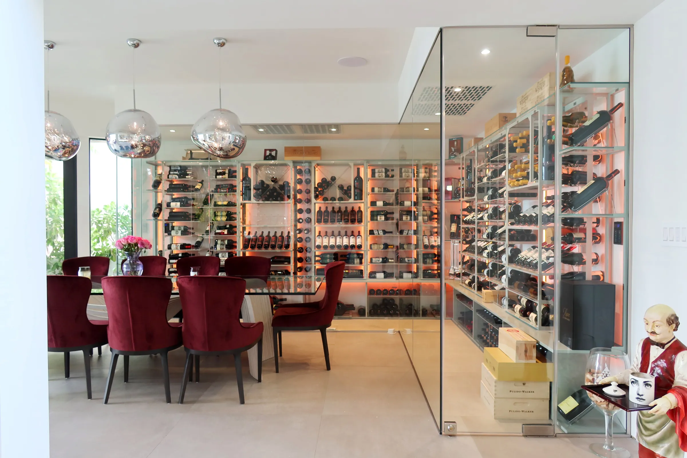 Modern wine cellar stainless steel wine display Venetian Dragon Cellars South Florida residence