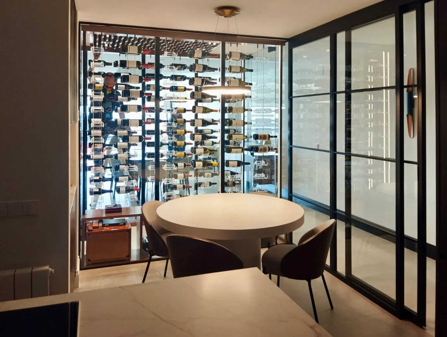 Modern Wine Room Miami - cable system acrylic hooks floating effect, wood bottom cabinet, LED strips — photograph 2 of 2