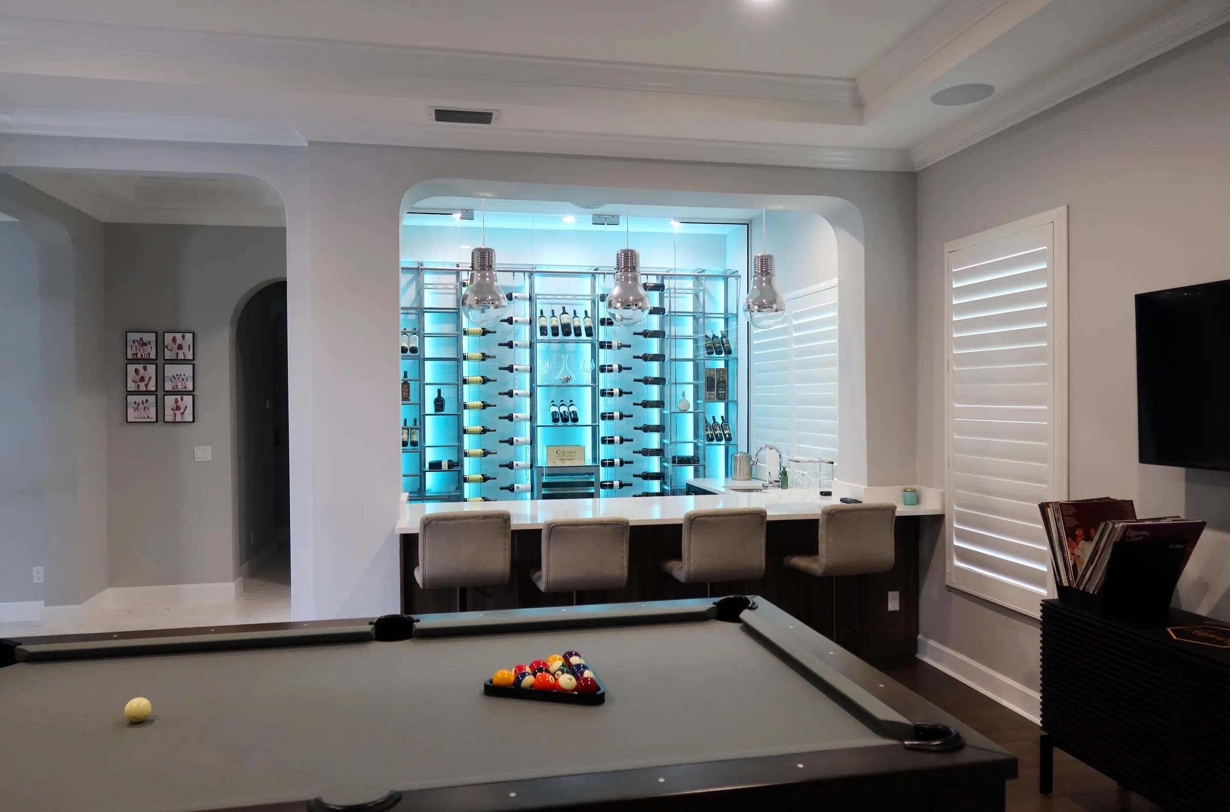 Custom wine wall Miami featuring glass enclosure, illuminated bottle displays, and contemporary luxury wine storage — photograph 3 of 4