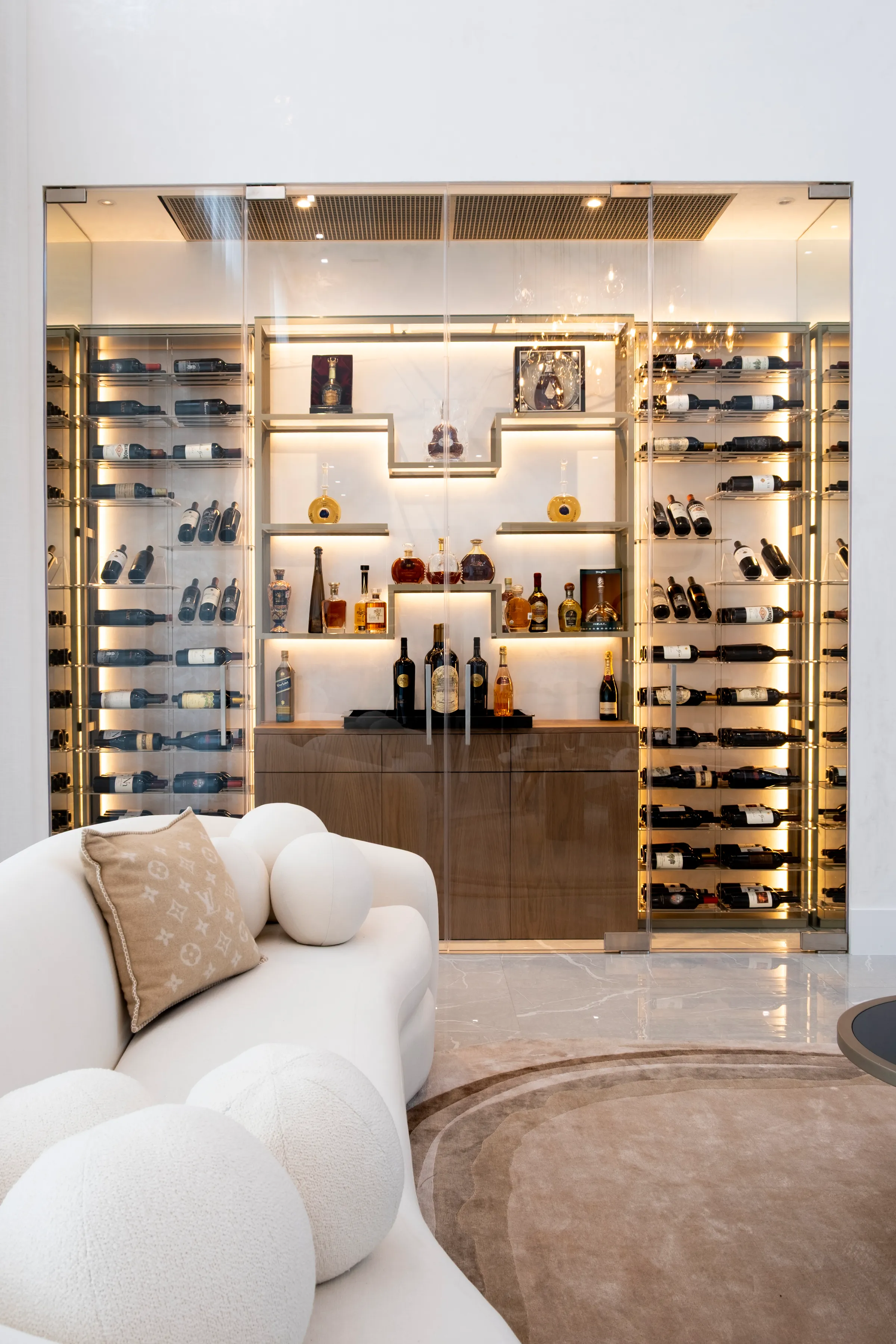 Custom wine wall Miami metal and wooden wine racks, illuminated bottle displays, and contemporary luxury wine storage — photograph 2 of 3