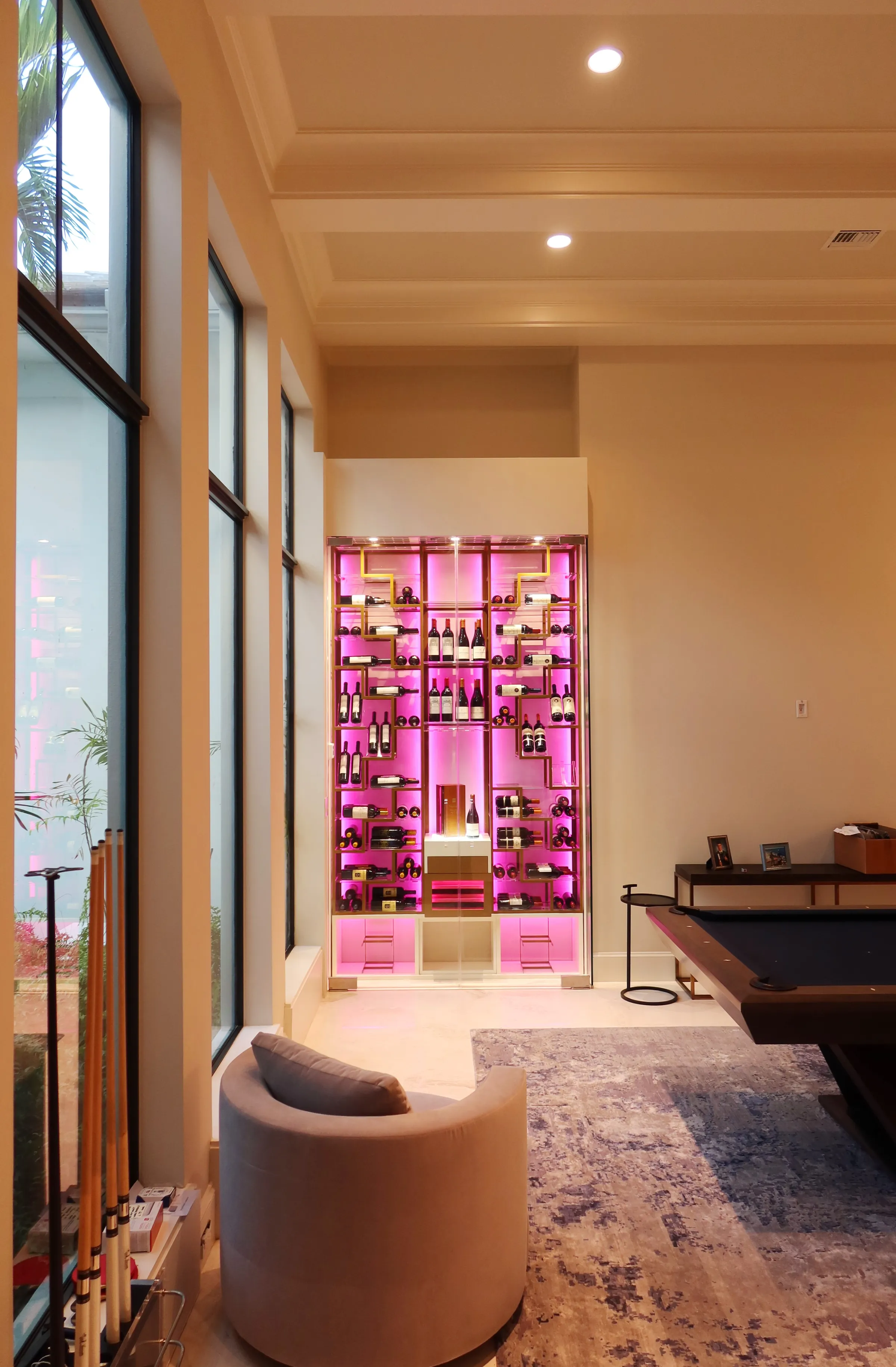 Custom wine wall Palm Beach featuring glass enclosure, illuminated bottle displays, and contemporary luxury wine storage — photograph 2 of 4