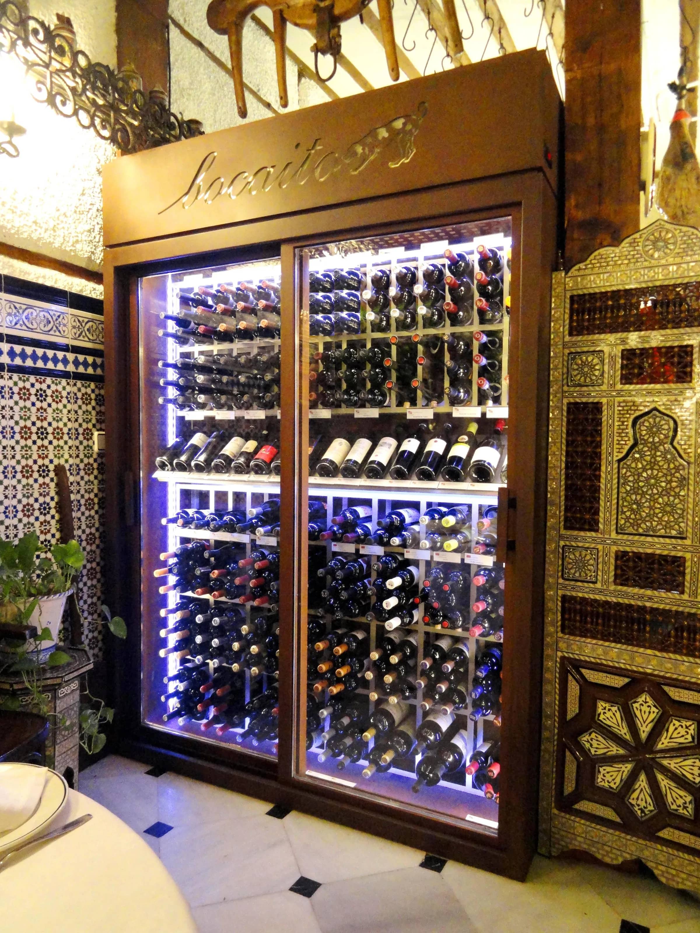 Restaurant wine cellar Madrid Spain Bocaito custom wine wall traditional design