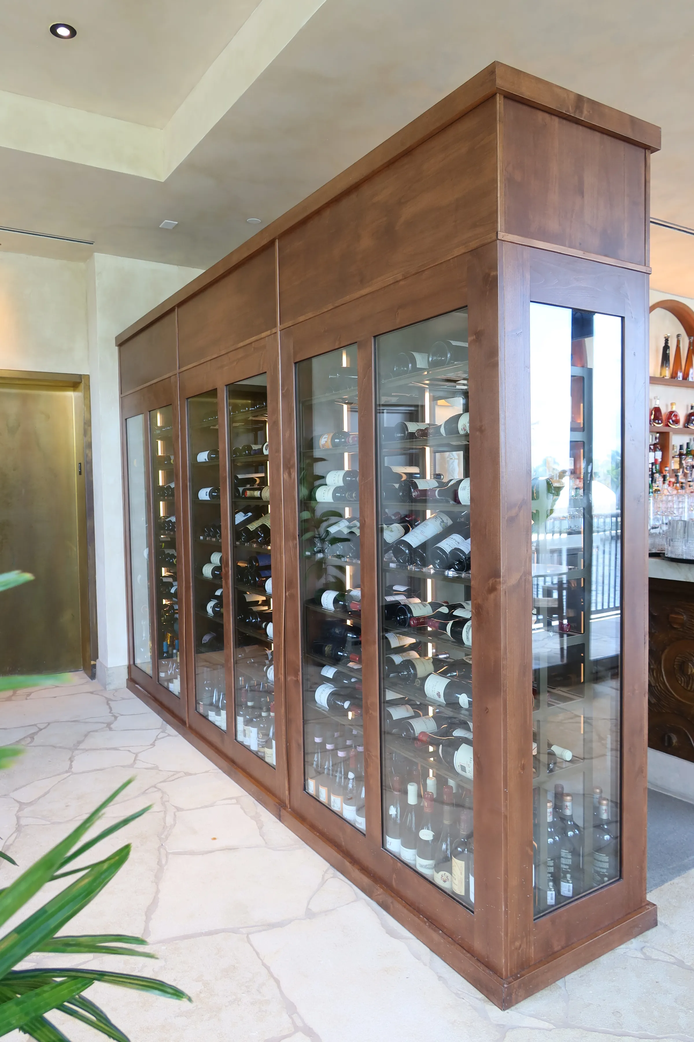 Restaurant wine cellar Miami Casa NEOS glass wine room LED lighting
